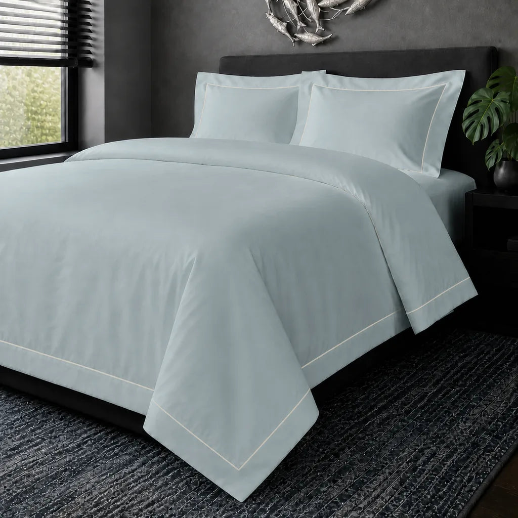 Duck Egg cotton 200TC Oxford duvet cover set with cream one-row satin stitch – hero view | Linen & Co