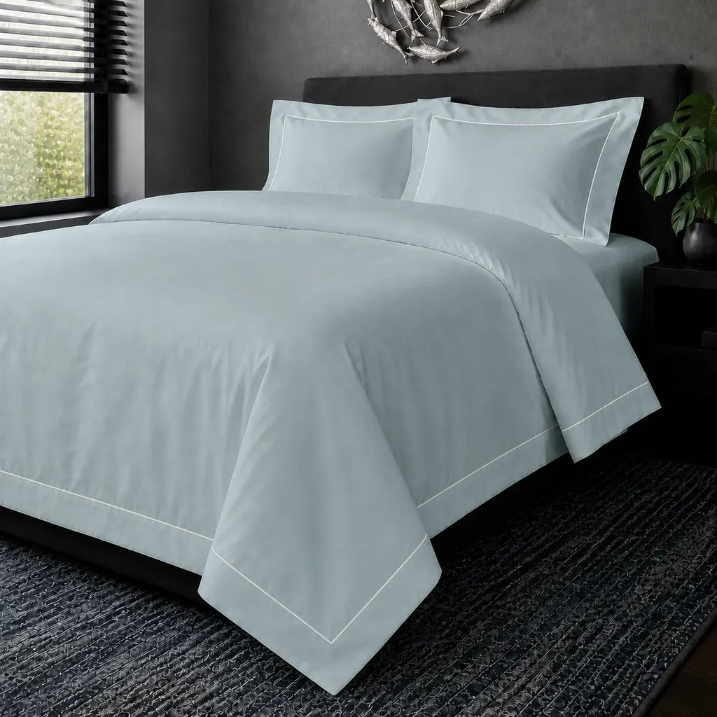 Duck Egg cotton 200TC Oxford duvet cover set with white one-row satin stitch – hero view | Linen & Co