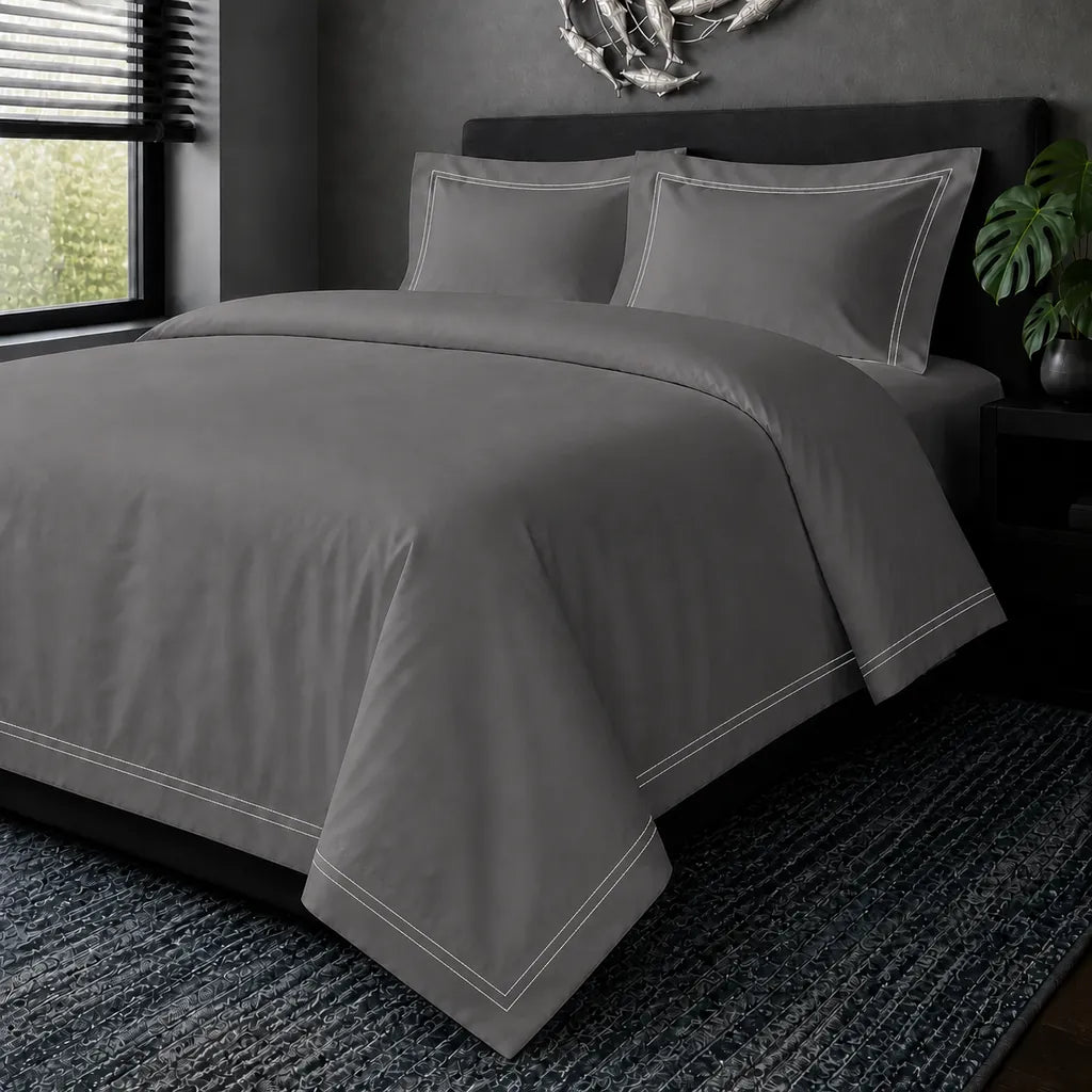 Grey cotton 200TC Oxford duvet cover set with white two-row satin stitch – hero view | Linen & Co