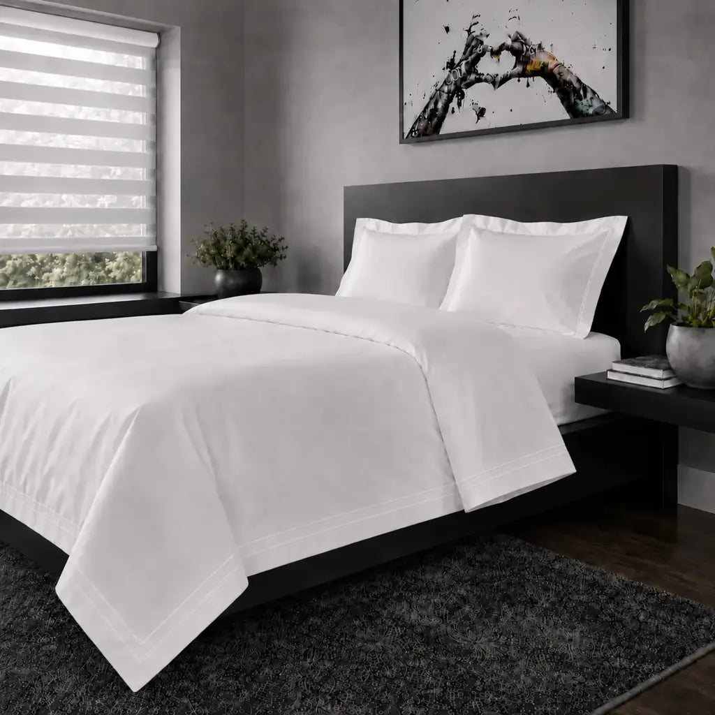 White polycotton percale Oxford duvet cover set with cream two-row satin stitch – hero view | Linen & Co