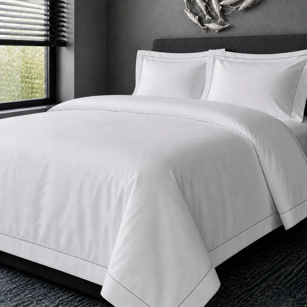 White cotton 200TC Oxford duvet cover set with grey one-row satin stitch – hero view | Linen & Co