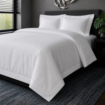 White cotton 200TC Oxford duvet cover set, no satin stitch – hero view | Linen & Co