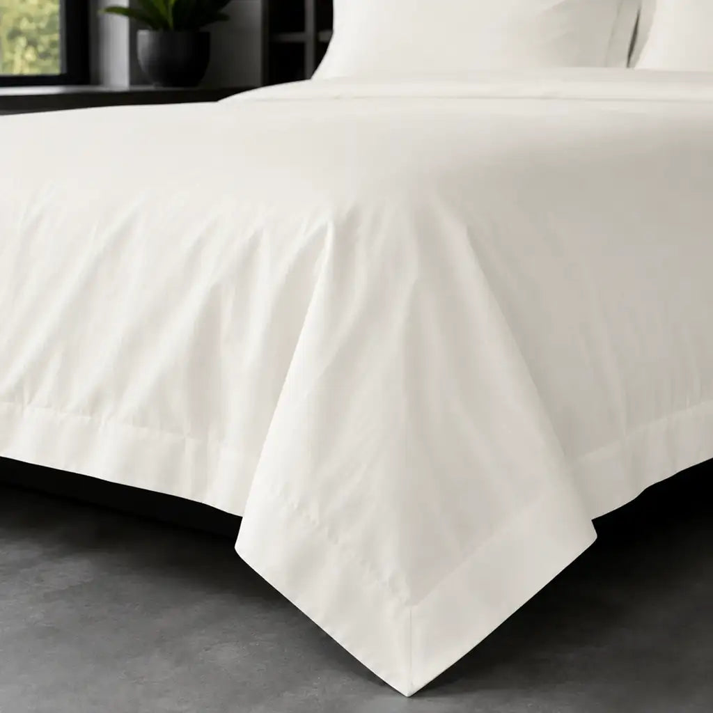 Cream polycotton percale 200TC Oxford duvet cover on bed with no satin stitch - Linen and Co