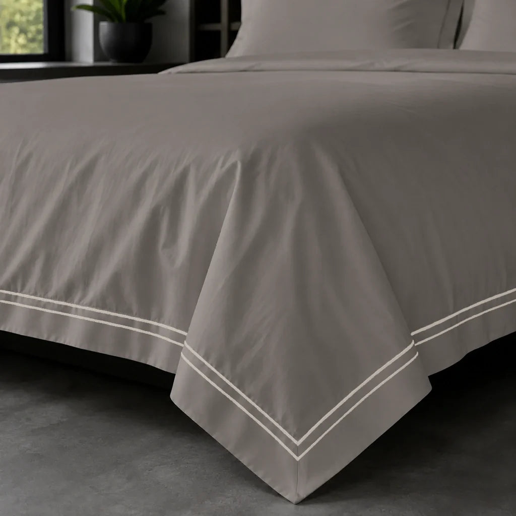 Stone Oxford duvet cover set - Stone Two Row Satin Stitch - on-the-bed corner view - Linen and Co