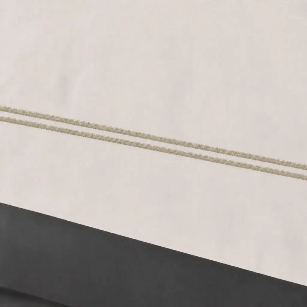 Close-up of cream polycotton percale 200TC Oxford cuff with Stone two-row satin stitch - Linen and Co