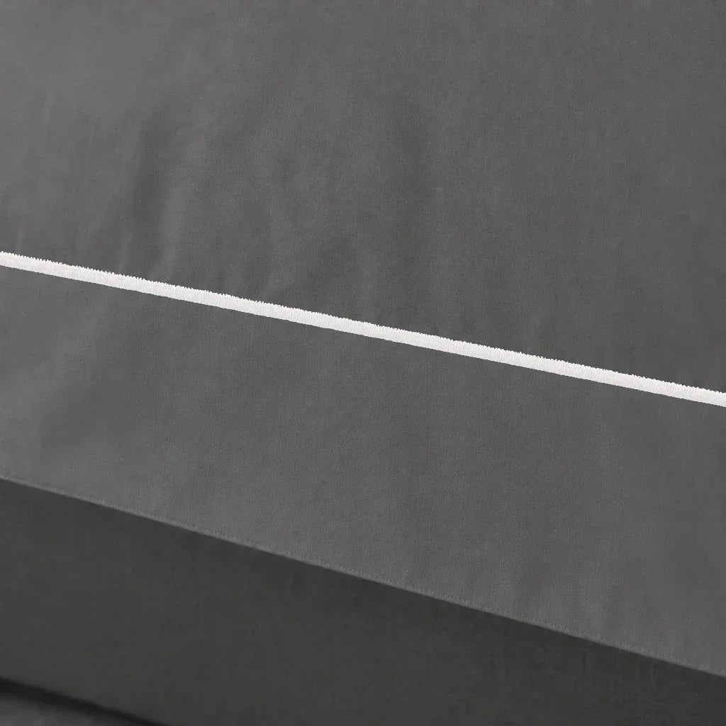 Grey cotton 200TC Oxford duvet cover set with cream one-row satin stitch – close up view | Linen & Co