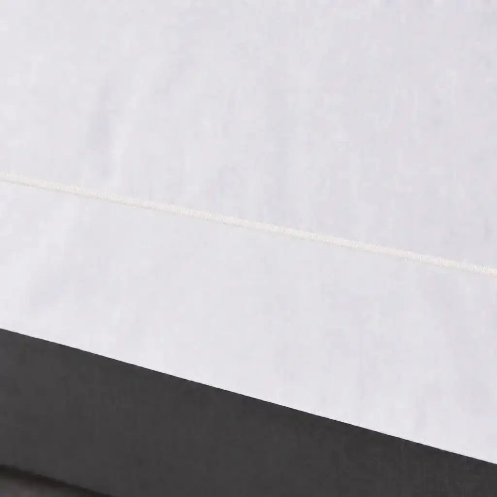 White polycotton percale Oxford duvet cover set with cream one-row satin stitch – close-up view | Linen & Co