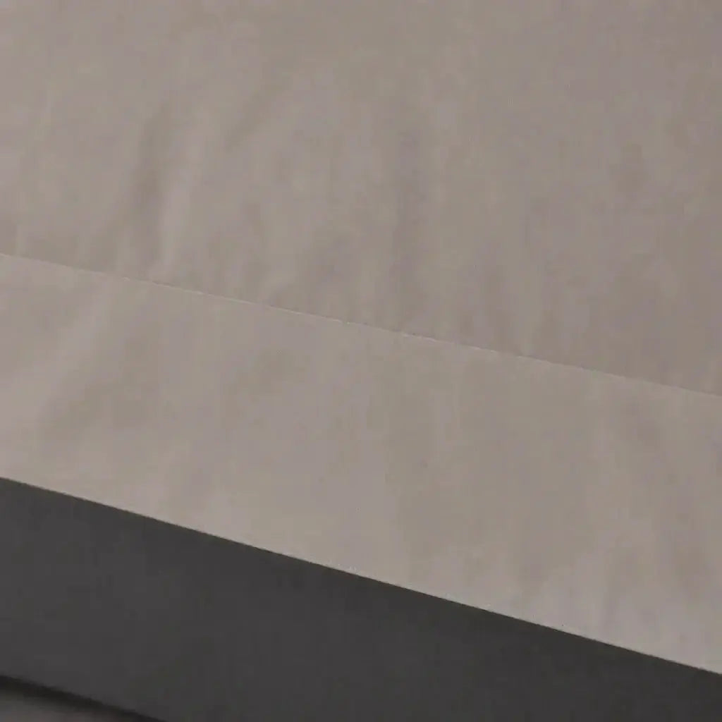 Close-up of the Stone Cotton 200TC Oxford duvet cover border without satin stitch.
