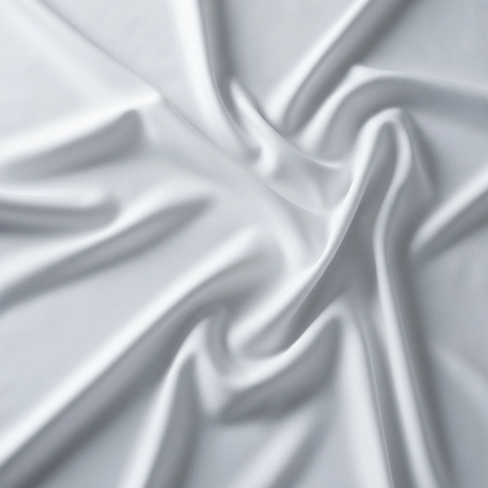 Close-up macro texture of white premium luxury cotton percale 300TC fabric displaying soft, smooth long-staple weave and superior quality—ultra-soft breathable bedding fabric by Linen & Co for luxury hospitality and residential use