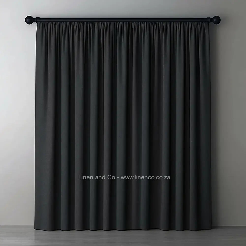 Charcoal Grey taped woven blockout curtain with 70% shade reduction, professional hospitality-grade window treatment featuring refined texture and elegant tone for luxury interior design by Linen and Co
