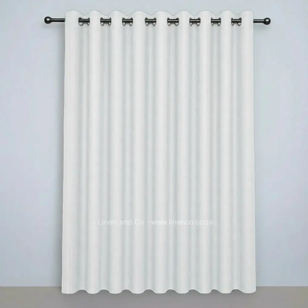 White eyelet woven blockout curtain with 70% shade reduction, professional hospitality-grade window treatment featuring refined texture and elegant tone for luxury interior design by Linen and Co