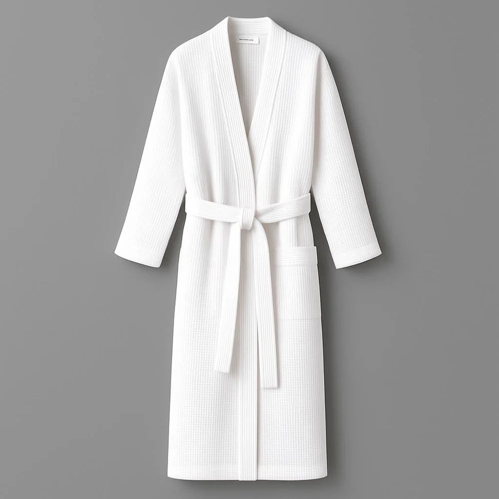 Linen and Co White Waffle bathrobe on a grey background