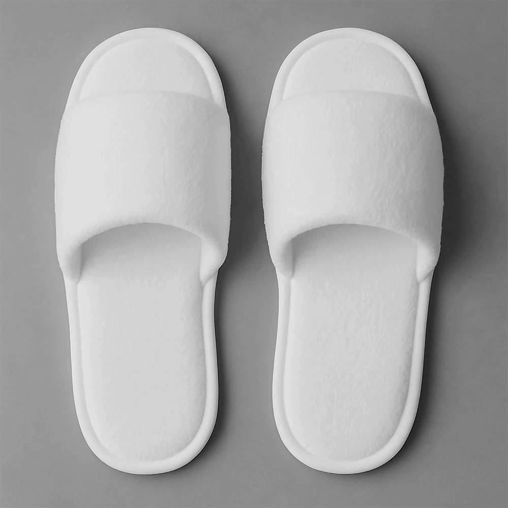 White open-toe disposable slippers by Linen and Co - premium hospitality footwear
