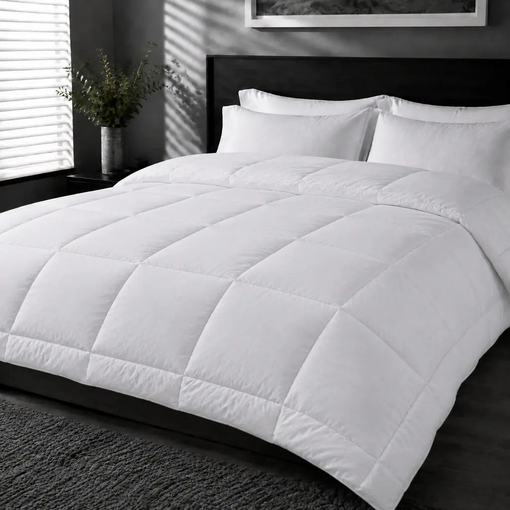 Bristol Sleep Luxury 320gsm white microfibre duvet inner with box stitching on a hotel bed – Linen and Co