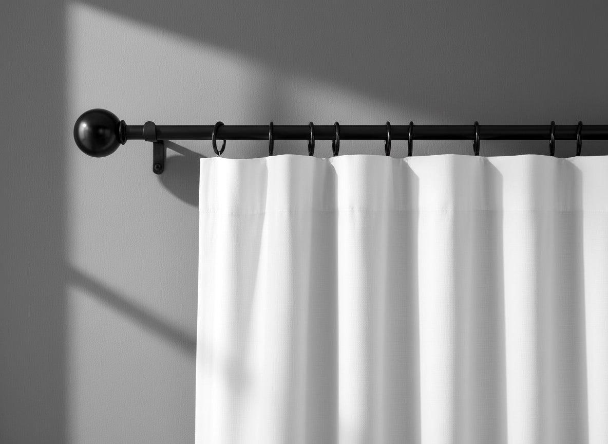 Black curtain rods and accessories with sleek modern design, durable and stylish for hospitality and residential interiors by Linen and Co