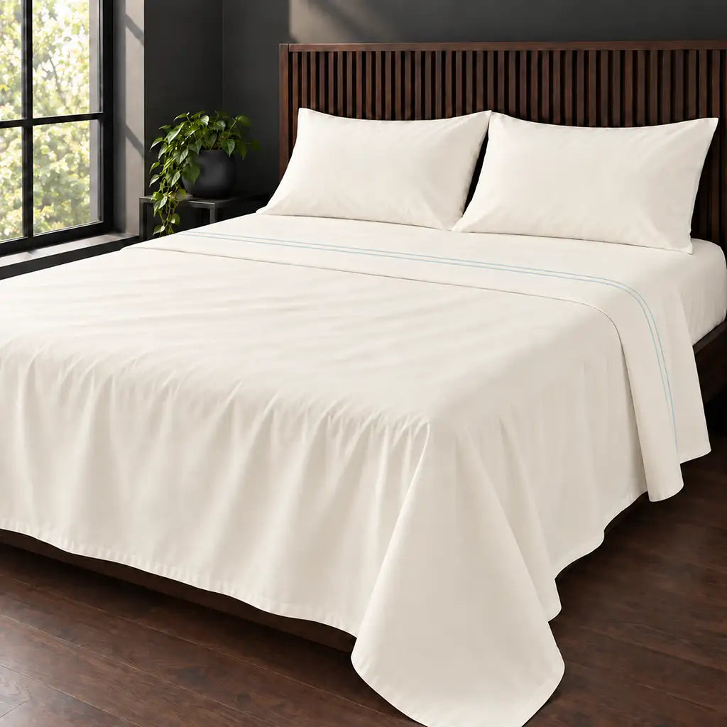 cream cotton percale 200tc flat sheet, two row duck egg satin stitch — hero — Linen and Co
