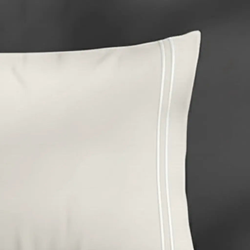 Ivory Cream Plain Pillow Case with White two-row satin stitch - border close-up - Linen and Co
