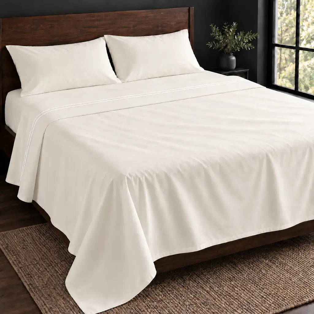 cream polycotton percale 200tc flat sheet, two row white satin stitch — hero — Linen and Co