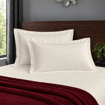 Oxford cream 200TC polycotton percale pillowcases with no satin stitch border by Linen and Co
