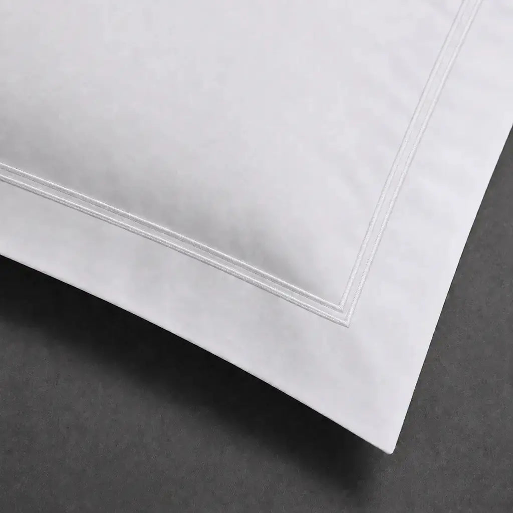 White 100% cotton percale 200TC Oxford pillow case, Standard and King, white two-row satin stitch — close-up detail.