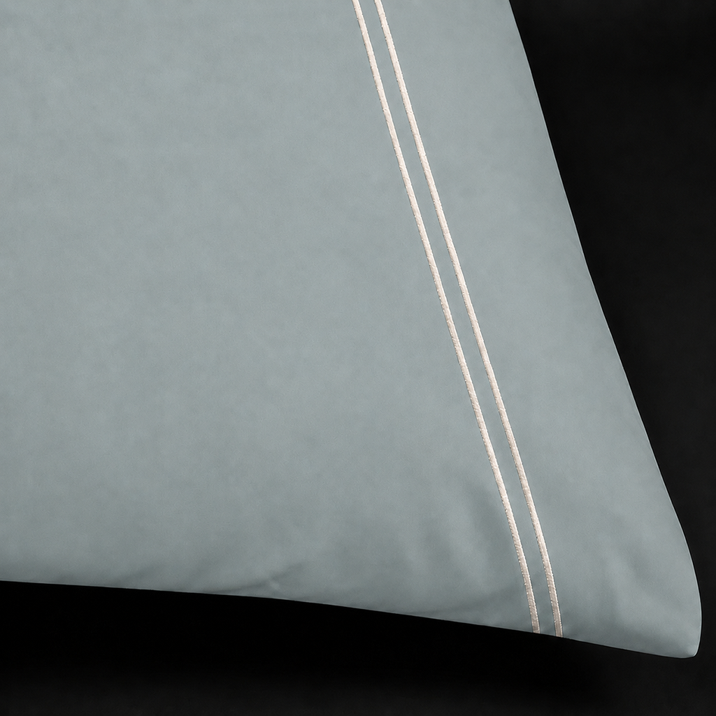Duck Egg 200TC cotton percale plain duvet cover set with Cream two row satin stitch - close-up - Linen and Co