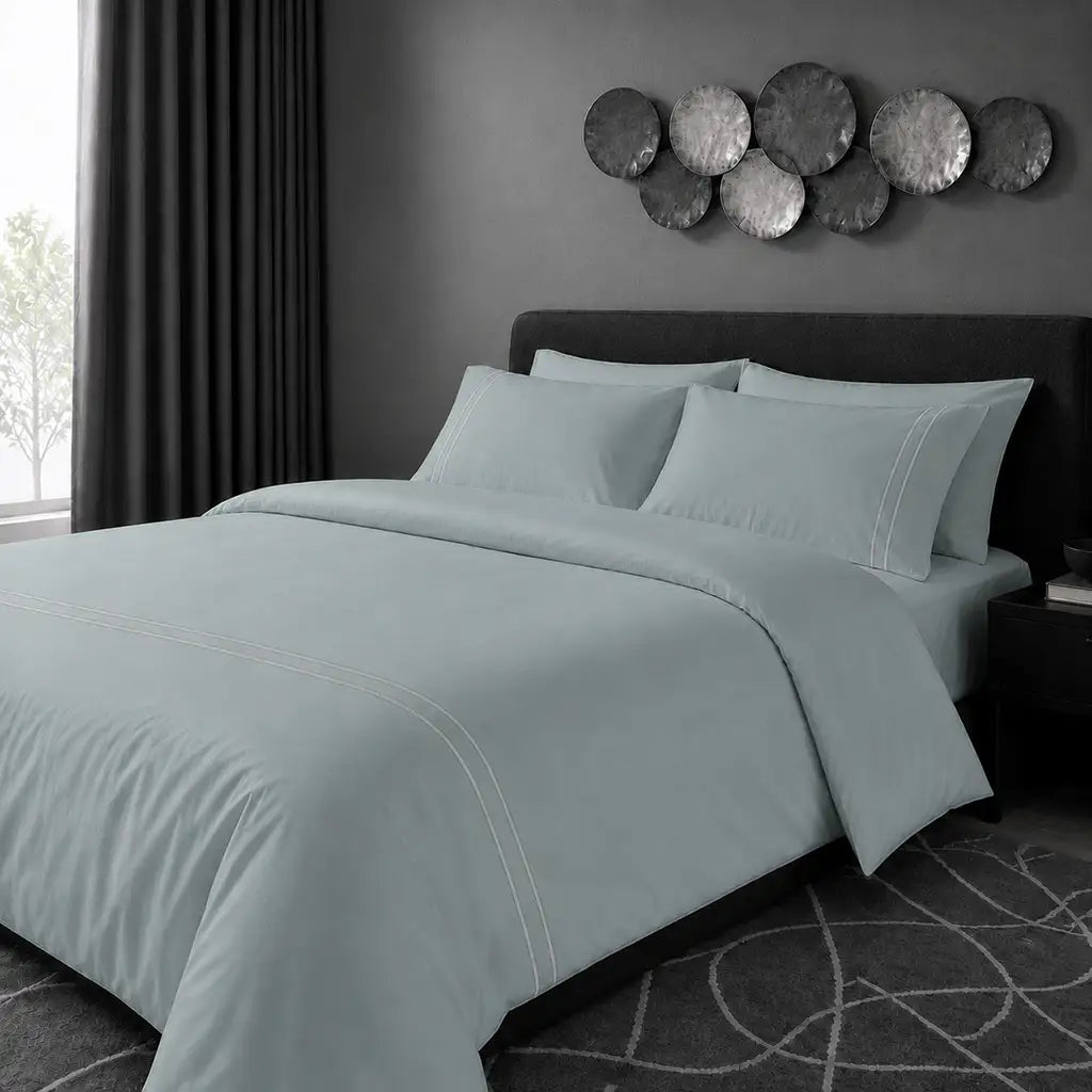 Duck Egg 200TC cotton percale plain duvet cover set with Grey two row satin stitch - pillow on bed - Linen and Co