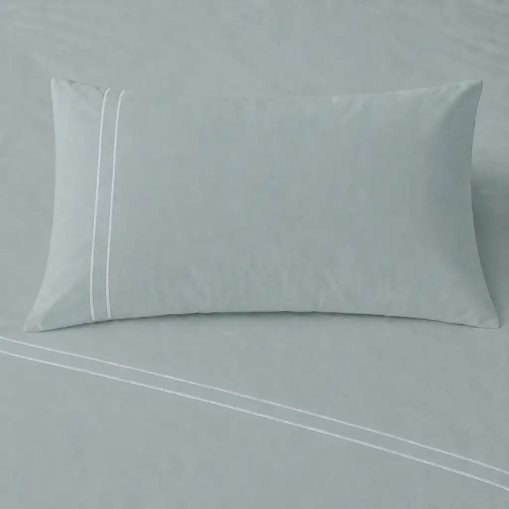 Duck Egg 200TC cotton percale plain duvet cover set with Grey two row satin stitch - pillow on bed - Linen and Co