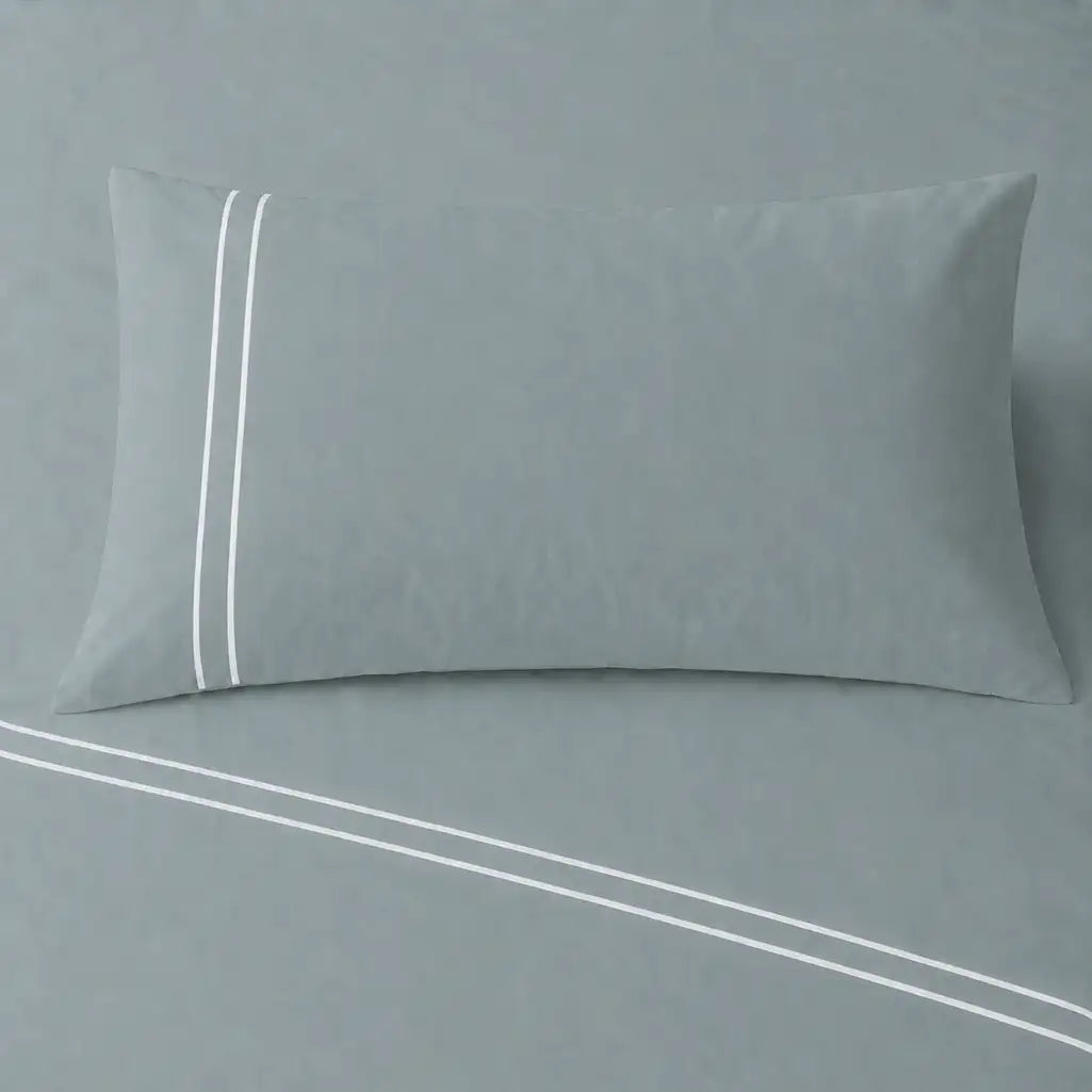Duck Egg 200TC cotton percale plain duvet cover set with White two row satin stitch - pillow on bed - Linen and Co