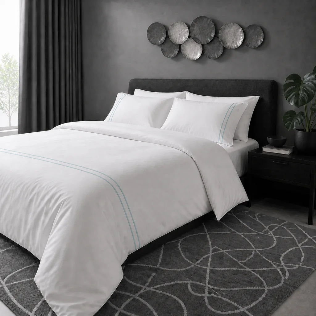 White 200TC plain duvet cover with Duck Egg two row satin stitch - hero - Linen and Co