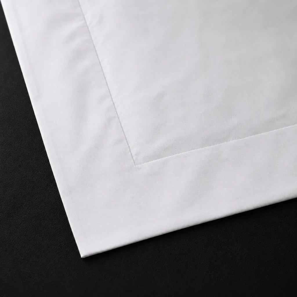 Close-up of a White 100% cotton percale 300TC Oxford pillow case with no satin stitch.