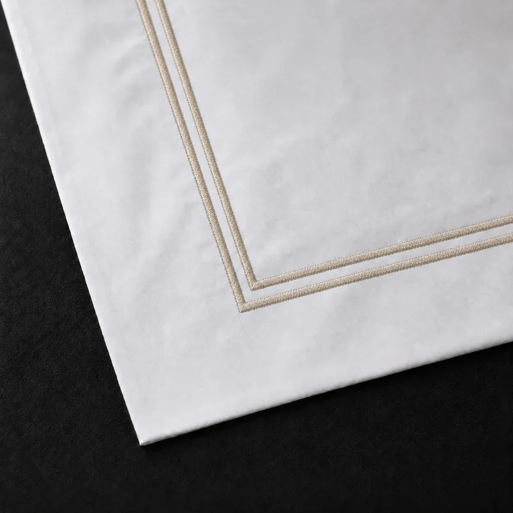 Close-up of a White 100% cotton percale 300TC Oxford pillow case with Stone two-row satin stitch.