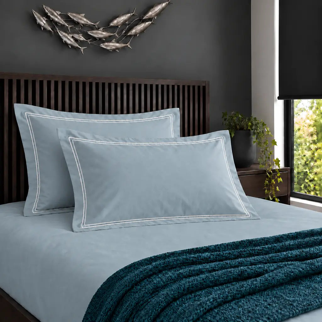 Oxford duck egg 200TC cotton percale pillowcases with two row white satin stitch border by Linen and Co