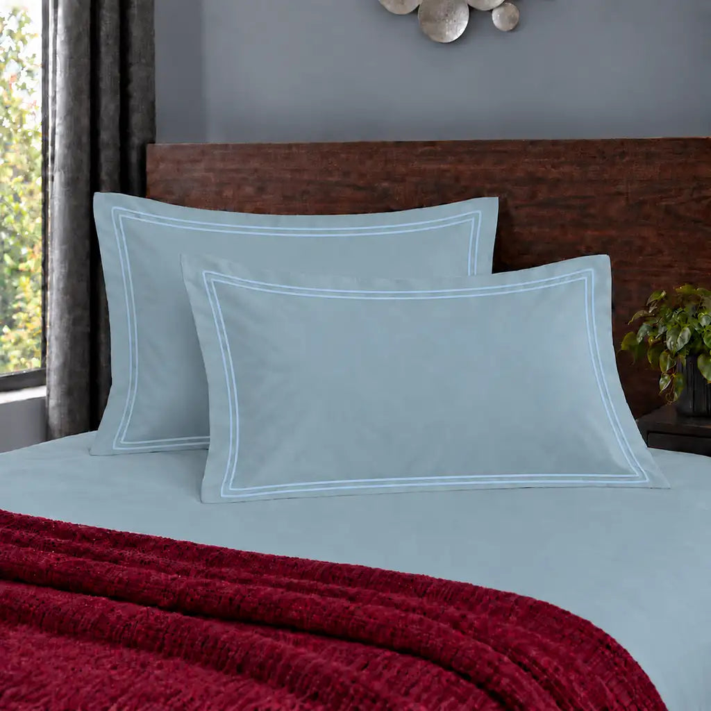 Oxford duck egg 200TC polycotton percale pillowcases with two row duck egg satin stitch border by Linen and Co