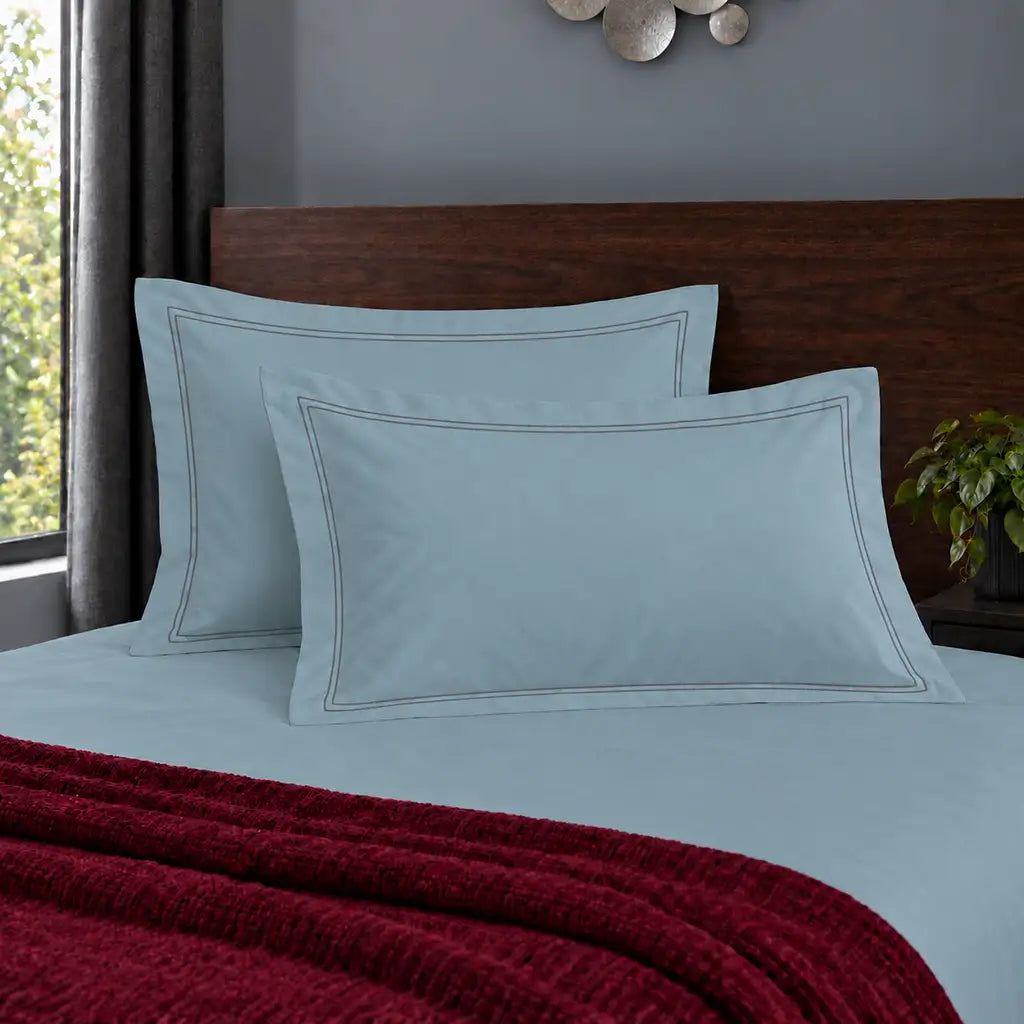 Oxford duck egg 200TC polycotton percale pillowcases with two row grey satin stitch border by Linen and Co