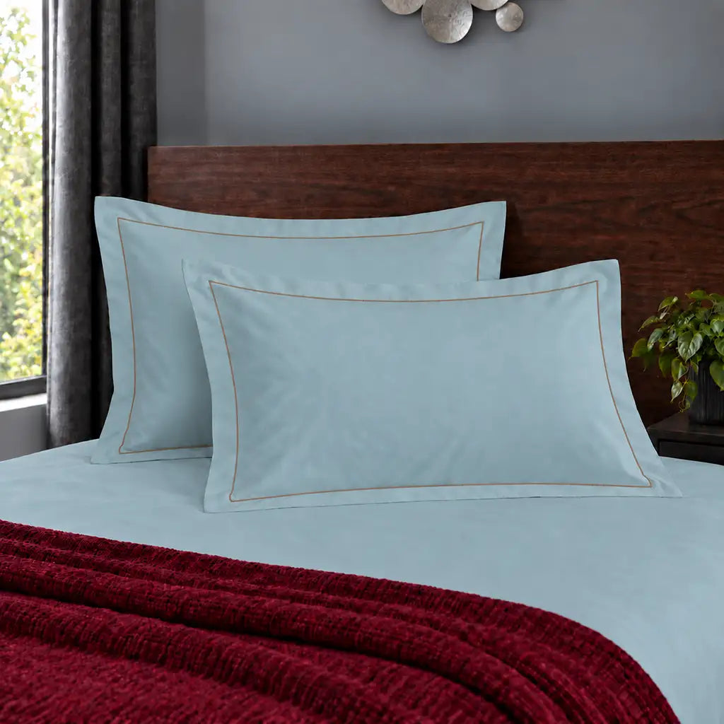 Oxford duck egg 200TC polycotton percale pillowcases with one row stone satin stitch border by Linen and Co
