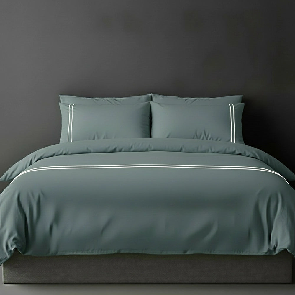Duck Egg duvet cover with white satin stitch and pillows by Linen and Co - luxury bed linen