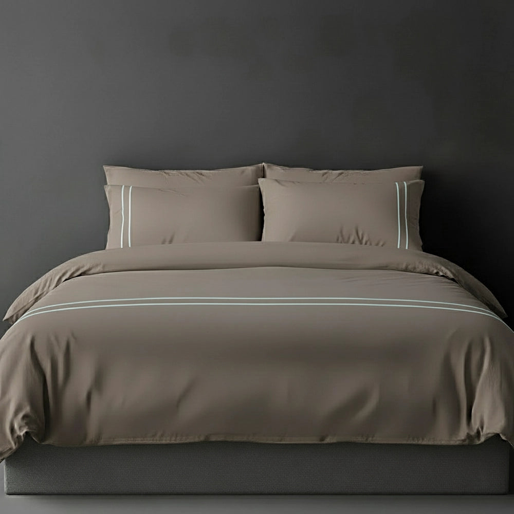 Stone duvet cover with duck egg satin stitch and pillows by Linen and Co - luxury bed linen