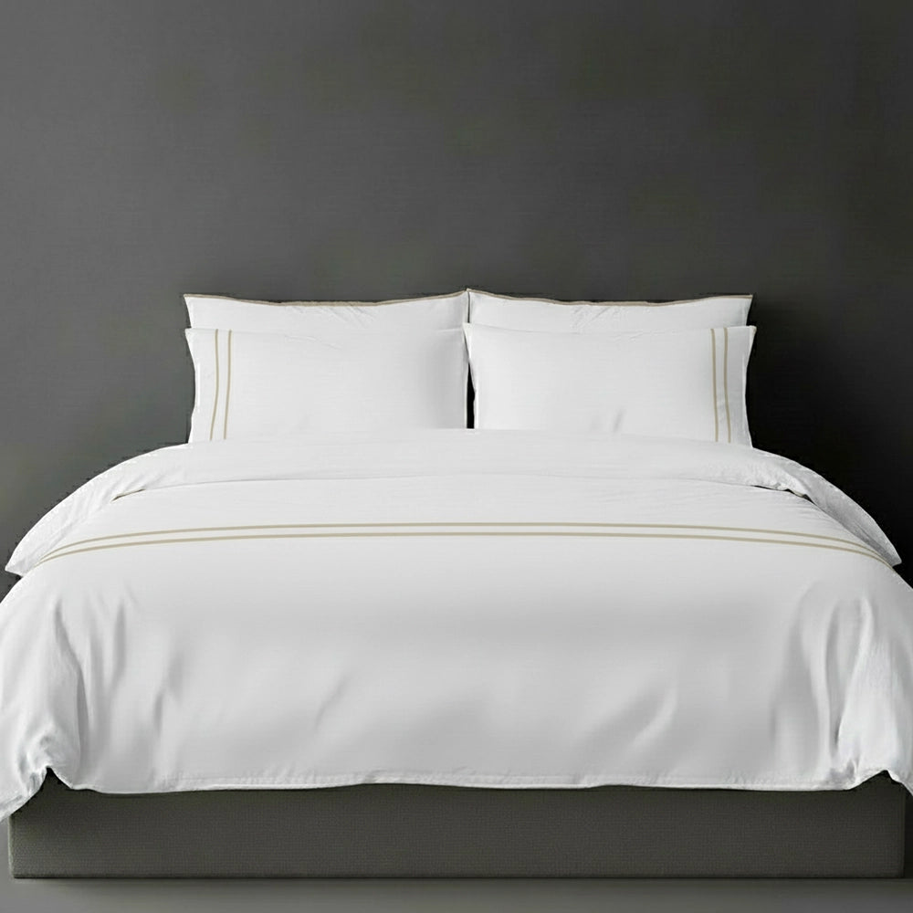 White duvet cover with stone satin stitch and pillows by Linen and Co - luxury bed linen