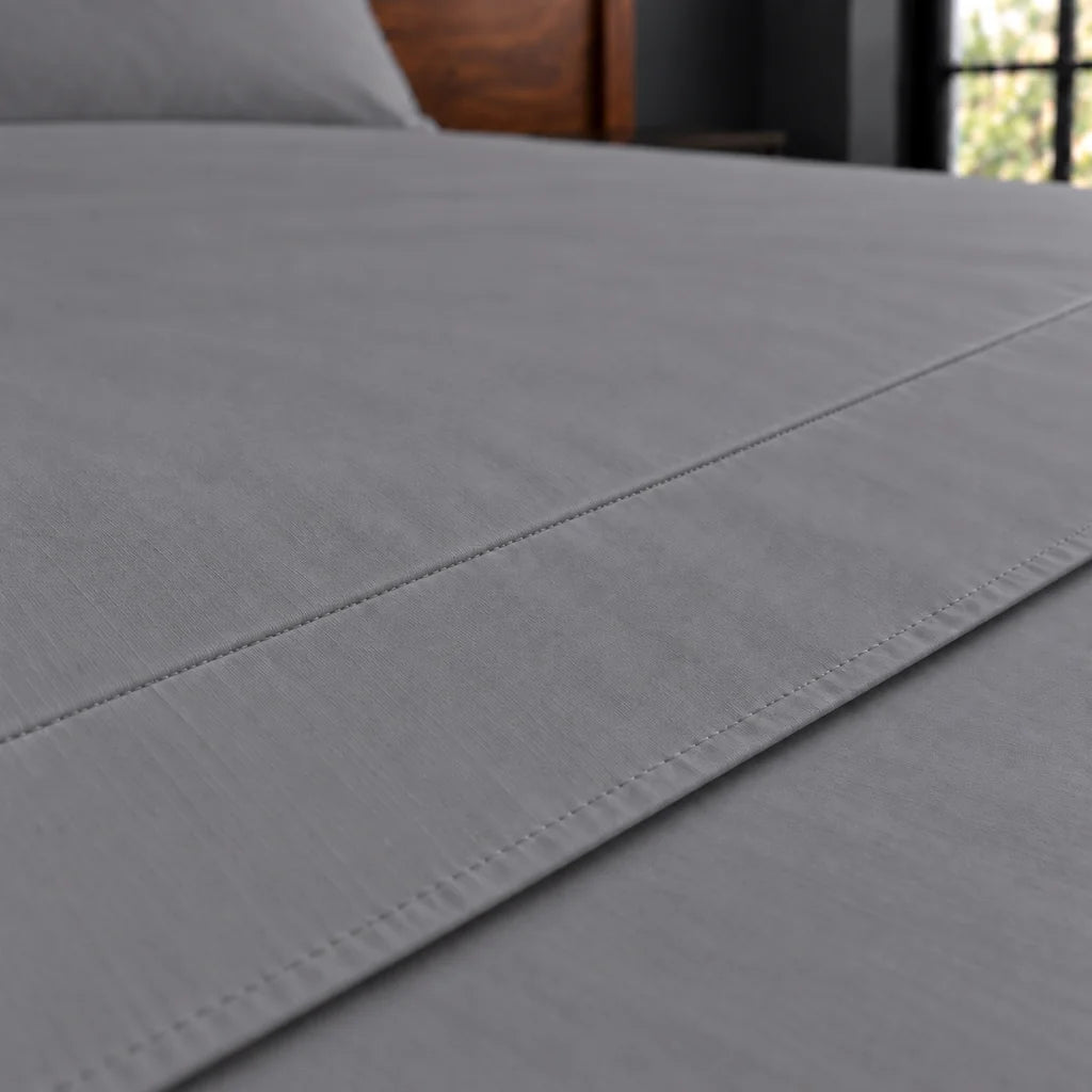 grey cotton percale 200tc flat sheet, plain no satin stitch — close up — Linen and Co