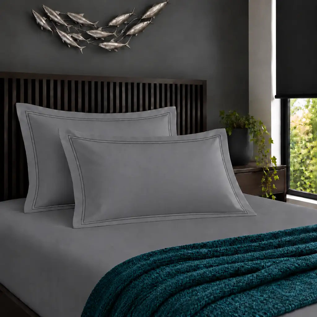 Oxford grey 200TC cotton percale pillowcases with two row grey satin stitch border by Linen and Co