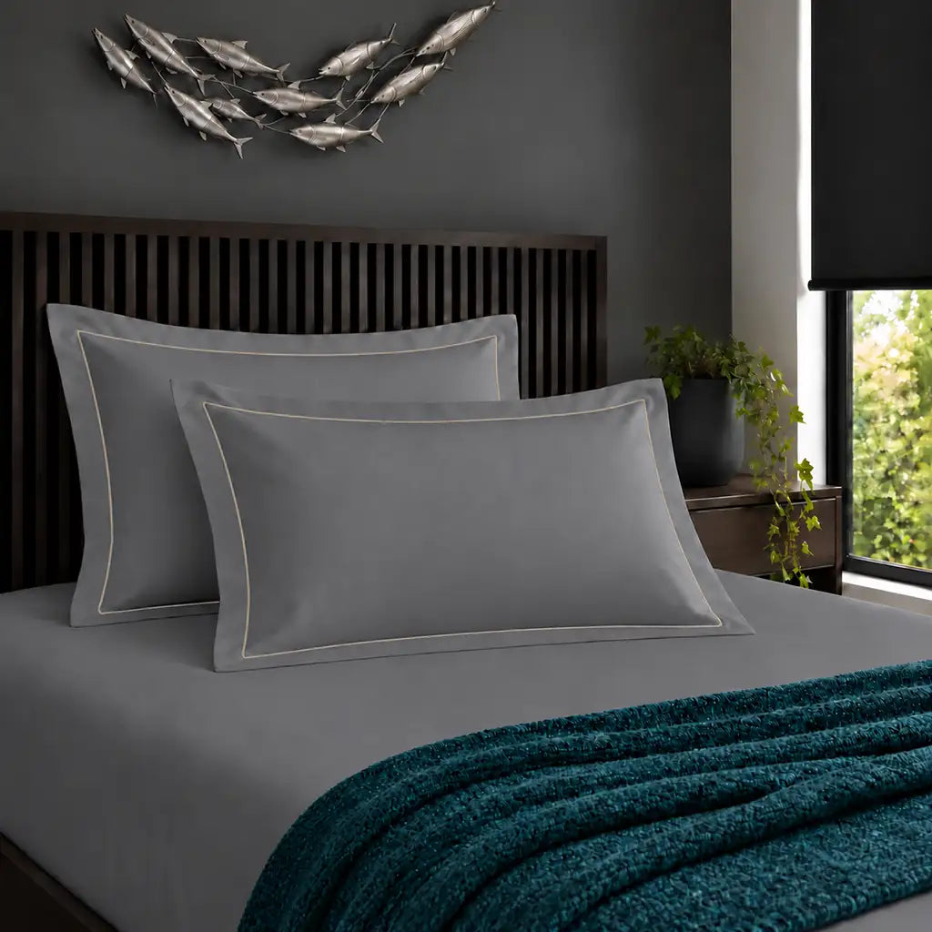 Oxford grey 200TC cotton percale pillowcases with one row grey satin stitch border by Linen and Co