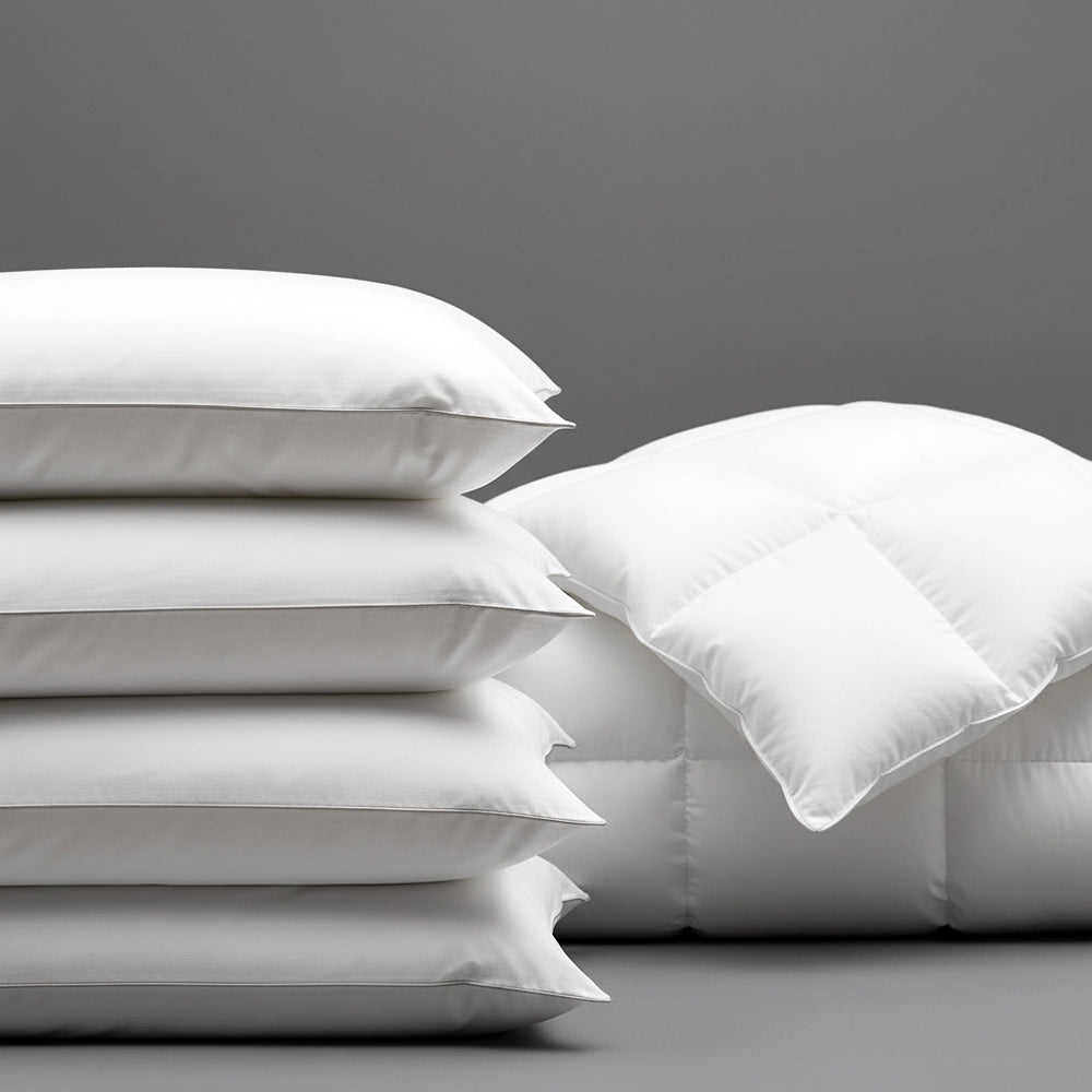 Hotel duvet inners and pillows by Linen and Co, featuring premium hospitality bedding essentials in crisp white
