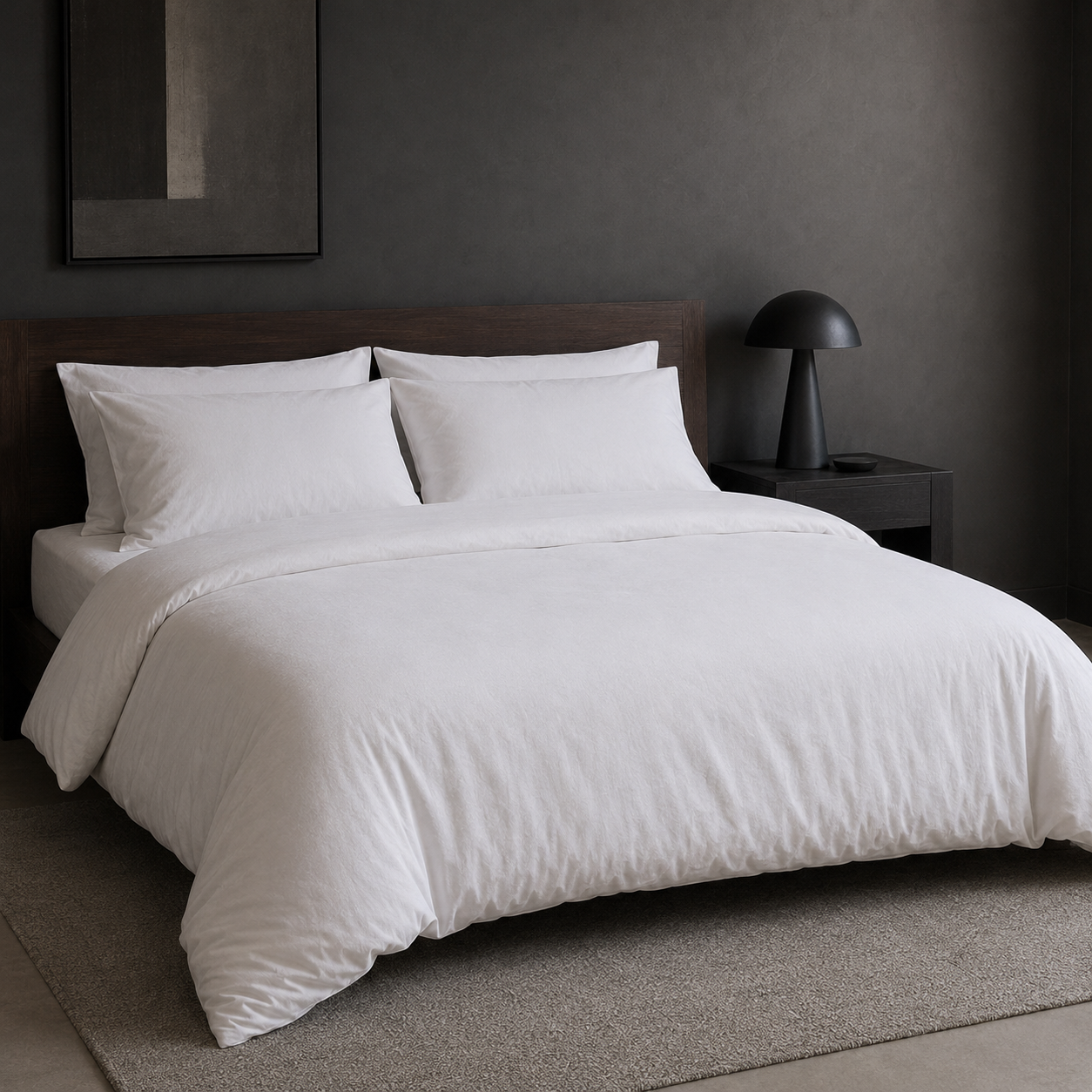 White cotton jersey duvet cover set styled on a bed
