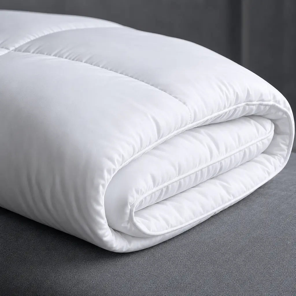Close-up of the soft loft and stitched white shell of the Luxury Microfibre Duvet Inner – Linen & Co
