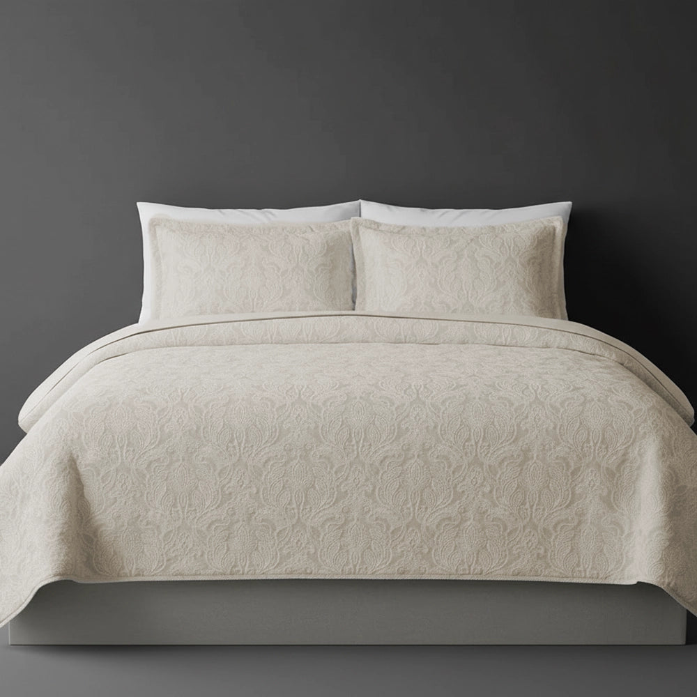 Natural Beige Kensington bedspread on bed by Linen and Co - luxury hospitality bedspread with textured finish