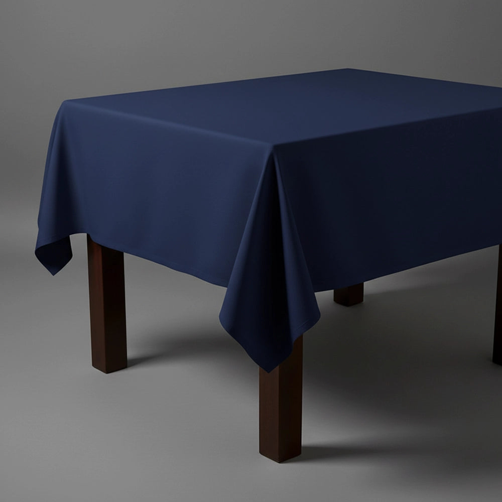 Navy blue square table cloth on wooden table by Linen and Co - premium hospitality table linen