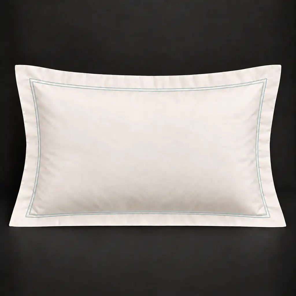 Cream Oxford 200TC polycotton percale pillowcase for Standard and King sizes with two row duck egg satin stitch border by Linen and Co