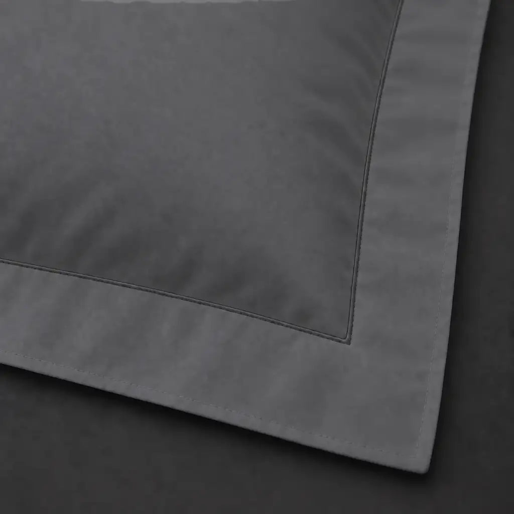 Close-up of grey Oxford pillowcase with one row grey satin stitch border by Linen and Co
