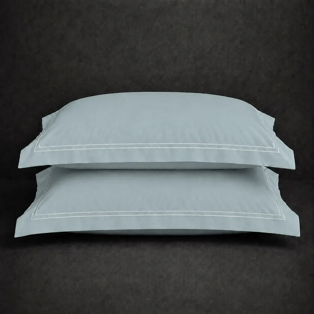Duck Egg polycotton percale 200TC Oxford pillow case, Standard and King, white two row satin stitch — stacked pair view.