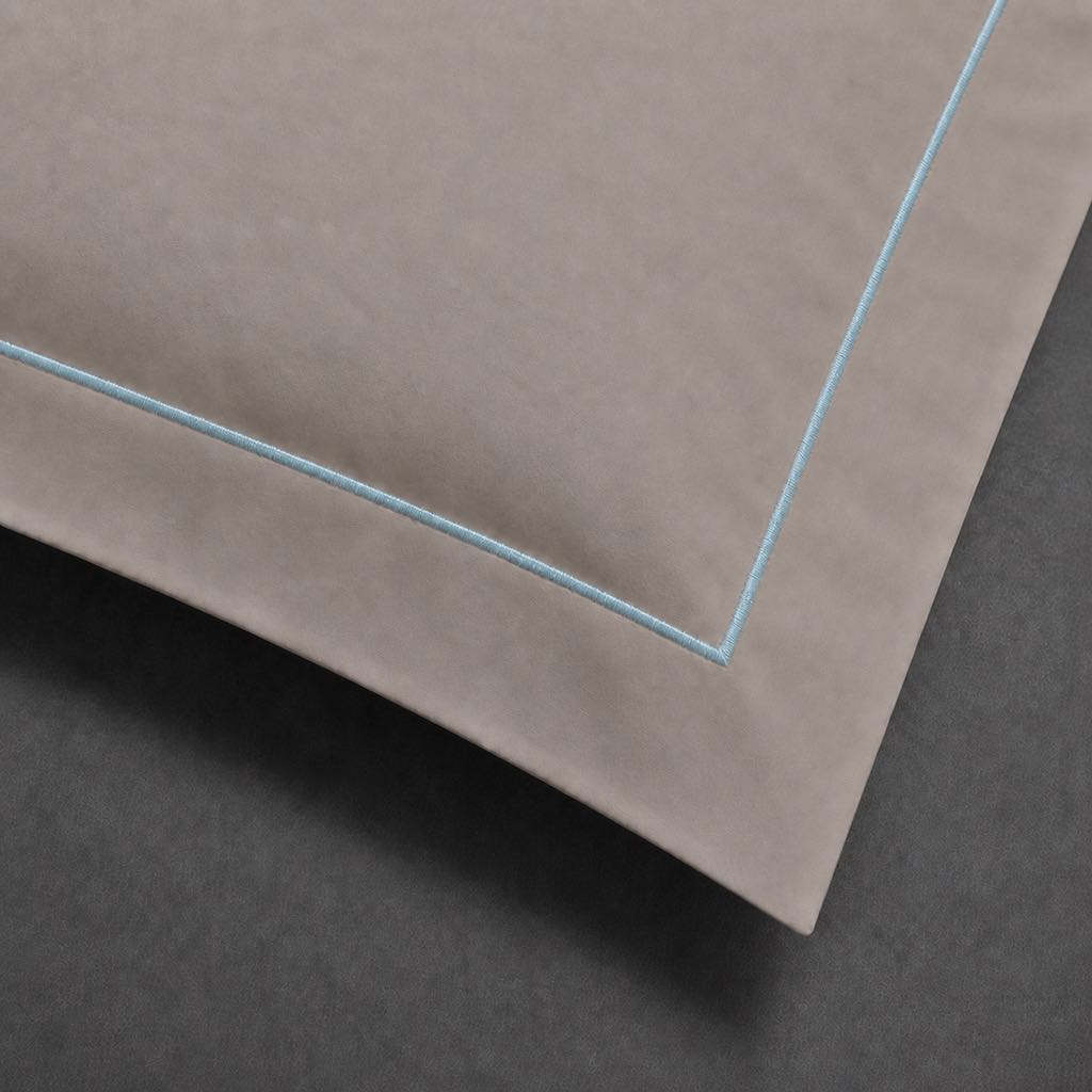 Stone polycotton percale 200TC Oxford pillow case, Standard and King, duck egg one row satin stitch — close-up detail.